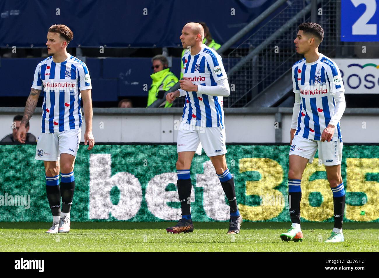 HEERENVEEN, NETHERLANDS - APRIL 10: Nick Bakker of SC Heerenveen, Sven van Beek of SC Heerenveen, Hamdi Akujobi of SC Heerenveen during the Dutch Eredivisie match between SC Heerenveen and FC Groningen at Abe Lenstra Stadion on April 10, 2022 in Heerenveen, Netherlands (Photo by Pieter van der Woude/Orange Pictures) Stock Photo