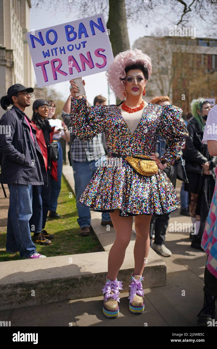 People take part in a protest outside Downing Street in London, over transgender people not being included in plans to ban conversion therapy. Picture date: Sunday April 10, 2022. Stock Photo