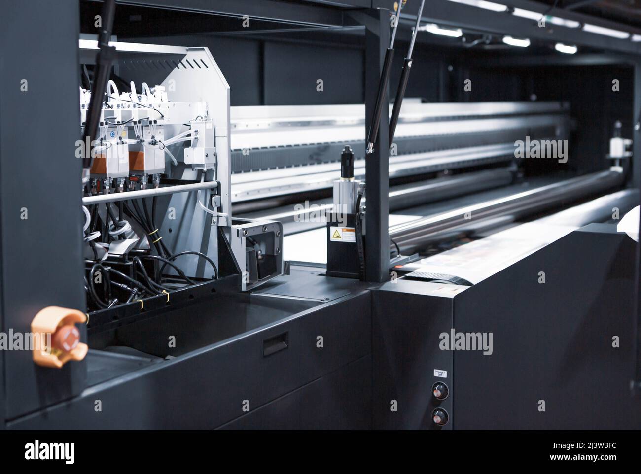 Wide format digital inkjet printer. Printing industry. Stock Photo