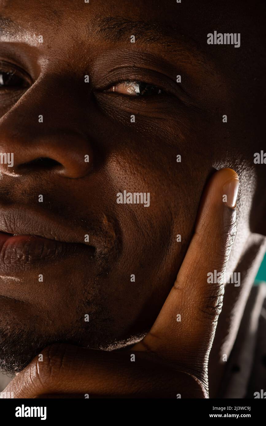 Close up portrait of handsome black male posing Stock Photo - Alamy