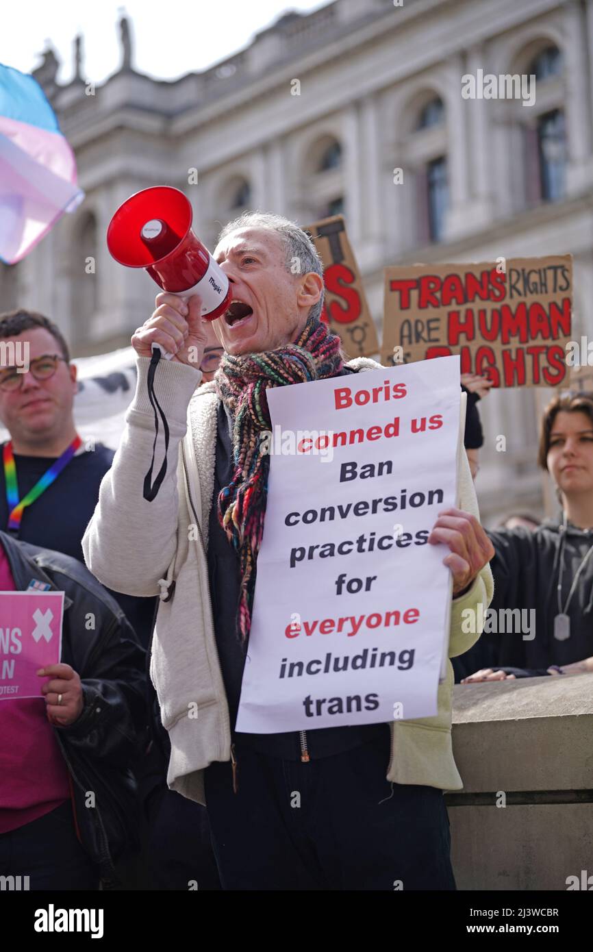 Peter Tatchell speaks during a protest outside Downing Street in London, over transgender people not being included in plans to ban conversion therapy. Picture date: Sunday April 10, 2022. Stock Photo