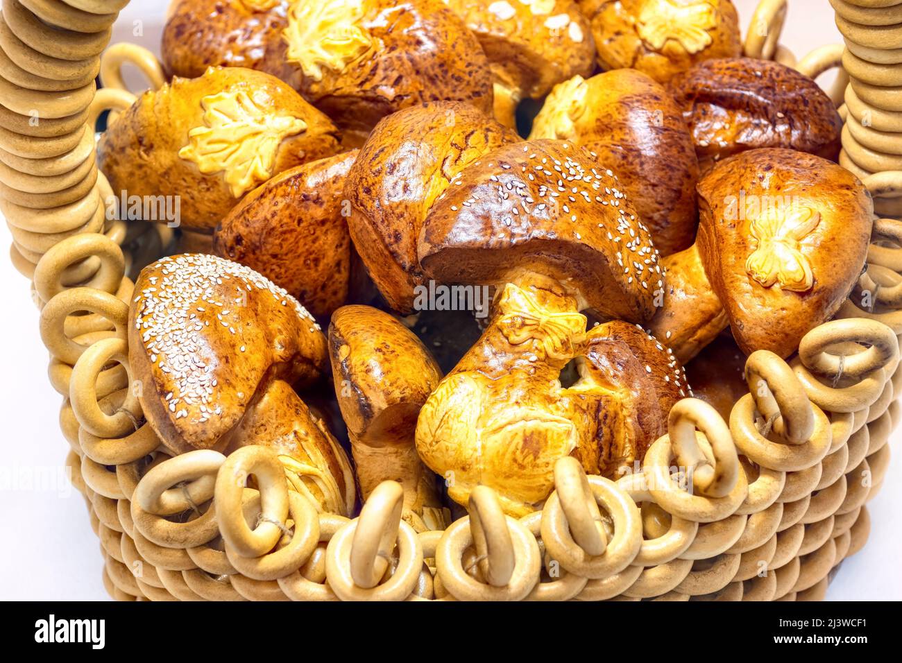 Mushroom shaped biscuits. Bagel basket with mushroom-shaped cookies. Stock Photo