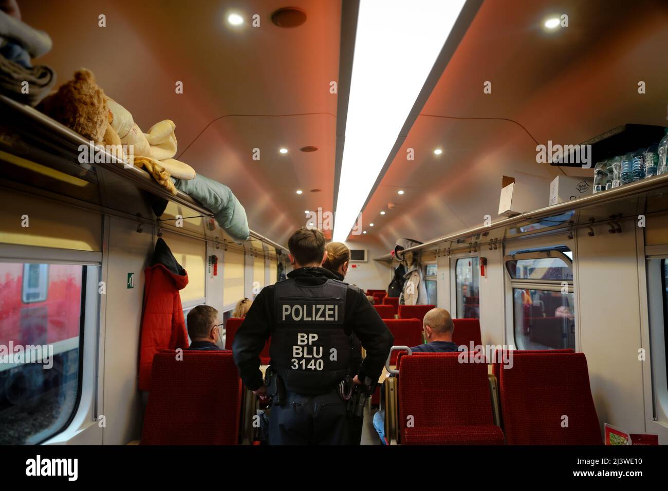 German-Polish border: Pass control in a refugee train with ukrainian people Stock Photo