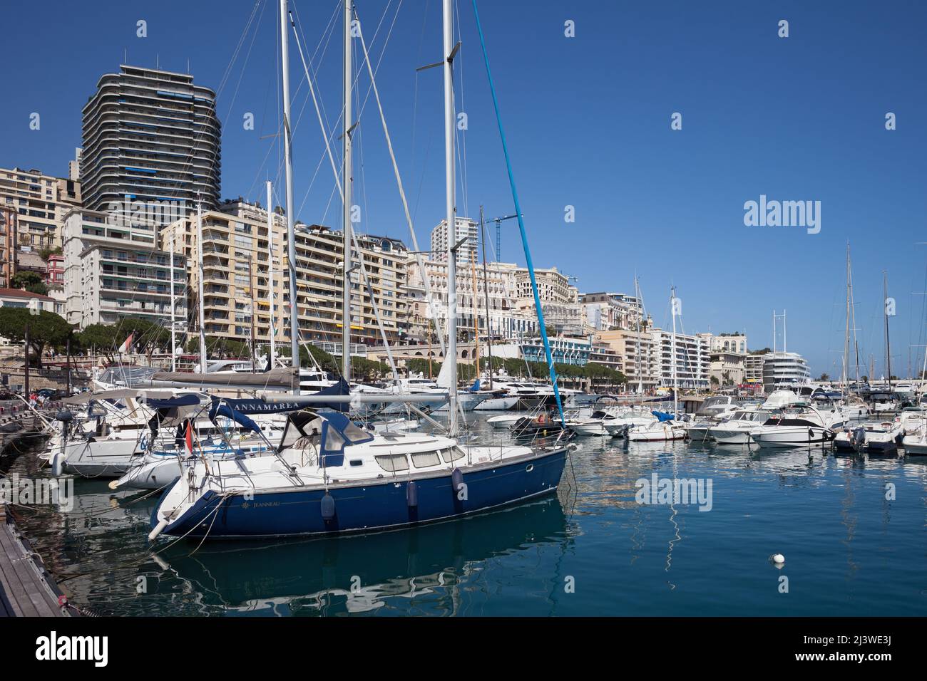 Monaco Principality skyline with sailing yachts and boats in Port Hercule. Stock Photo