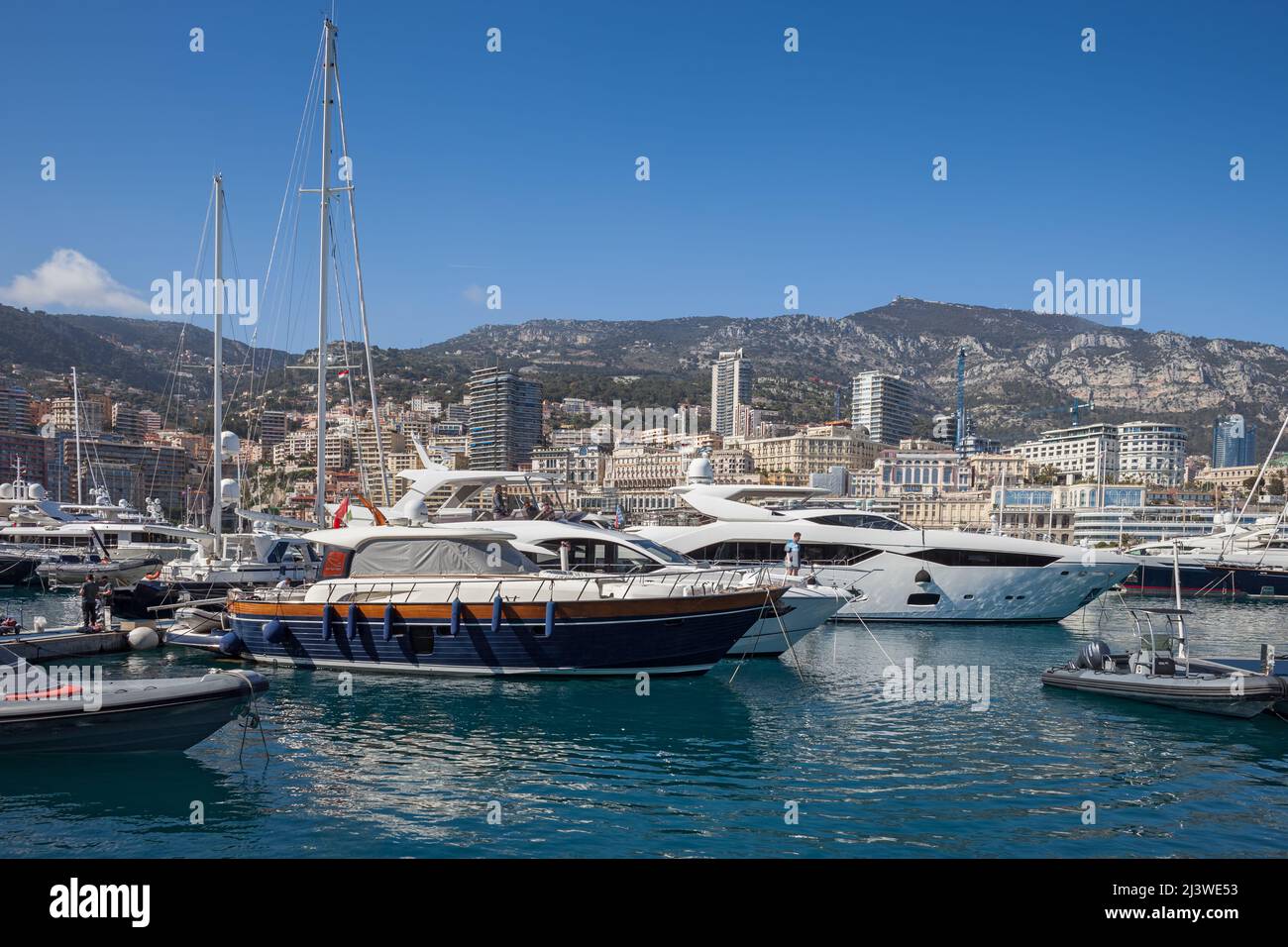 Principality of Monaco, yachts in Port Hercules and city skyline. Stock Photo