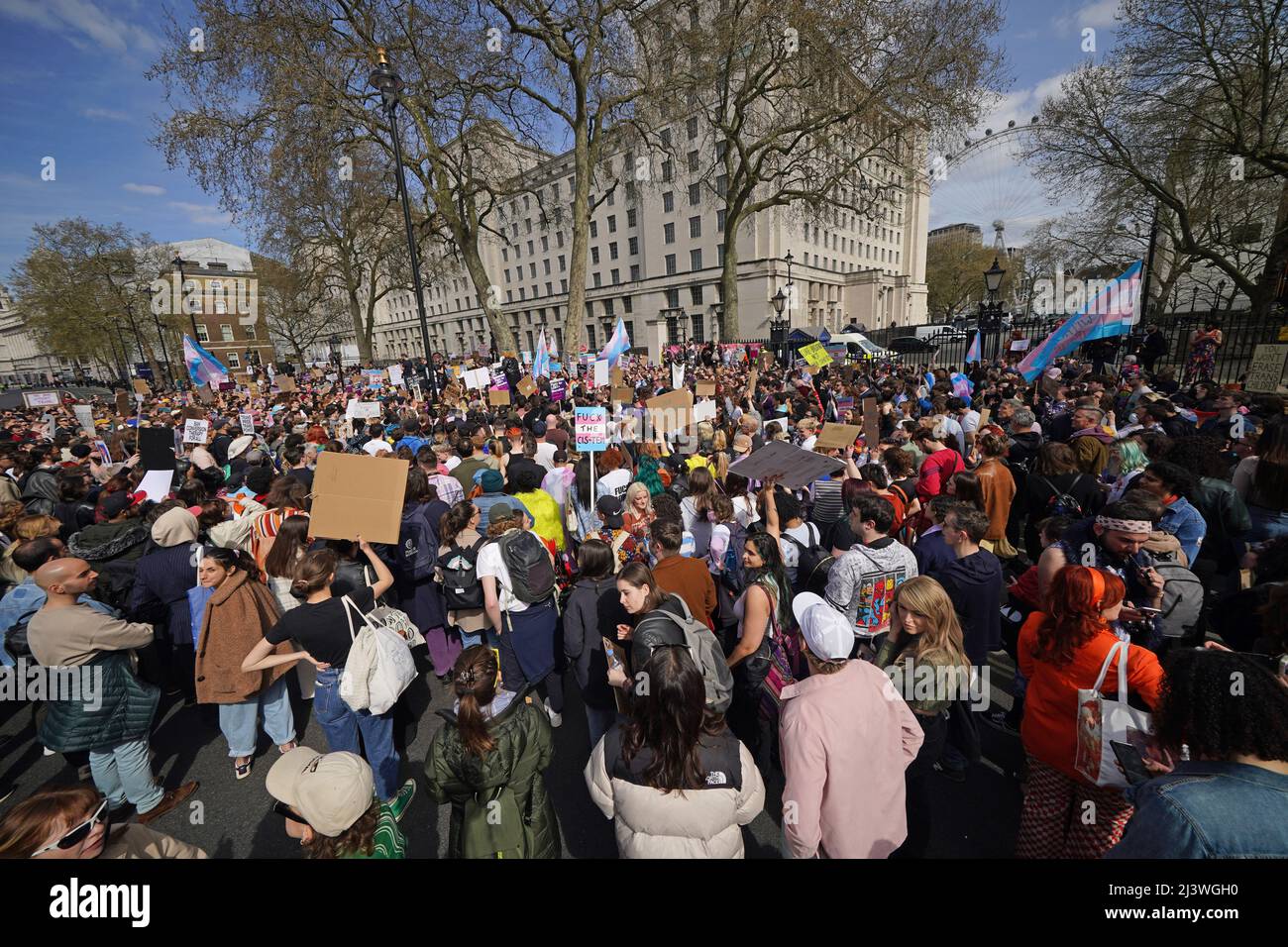 People take part in a demonstration outside Downing Street in London, to protest against the exclusion of transgender people from a ban on conversion therapy. Picture date: Sunday April 10, 2022. Stock Photo