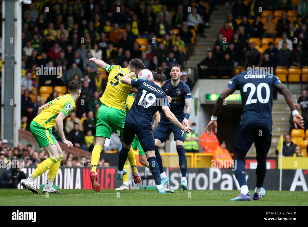 Grant Hanley #5 of Norwich City and Jay Rodriguez #19 of Burnley challenge for a header in the Norwich box Stock Photo