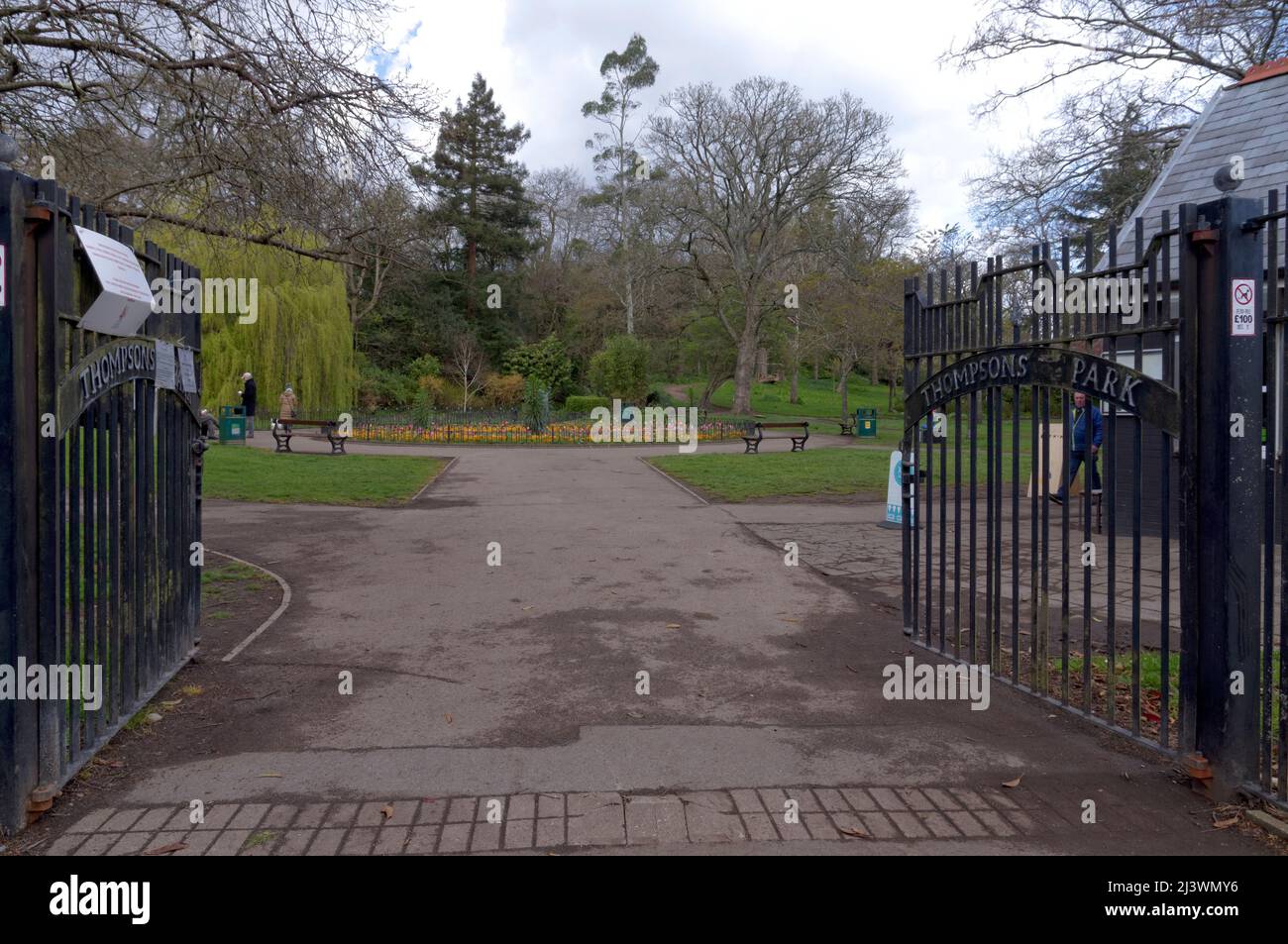 View from main gate, Thompson's Park, Romilly Road Cardiff with several people enjoying the outdoors Stock Photo