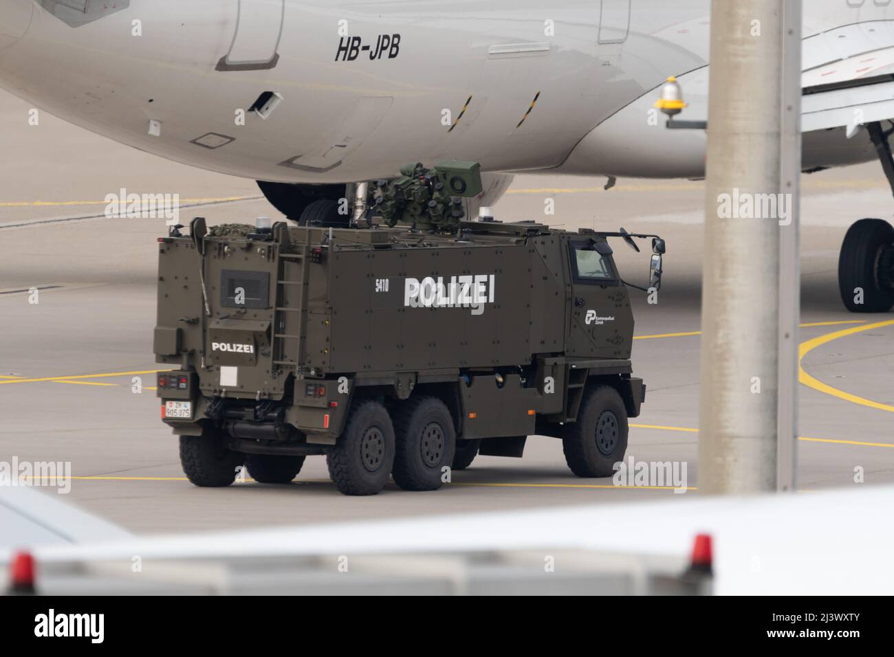 Zurich, Switzerland, March 2, 2022 Swiss International Airlines Airbus A321-271N aircraft is escorted by the police to its take off position Stock Photo