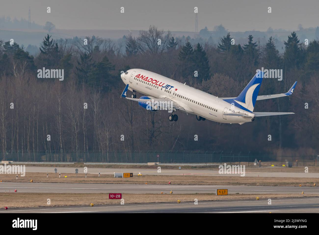 Zurich, Switzerland, March 2, 2022 Anadolujet Boeing 737-8F2 aircraft is departing from runway 28 Stock Photo