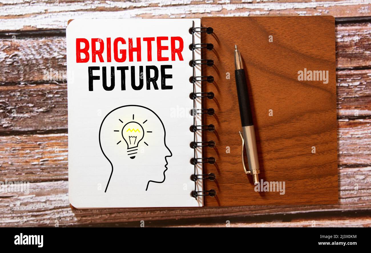 Brighter Future text on notepad on office desk Stock Photo