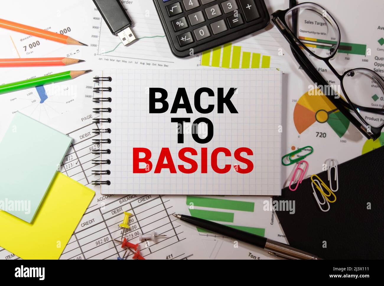 Business concept. Notebook with text BACK TO BASIC sheet of white paper ...