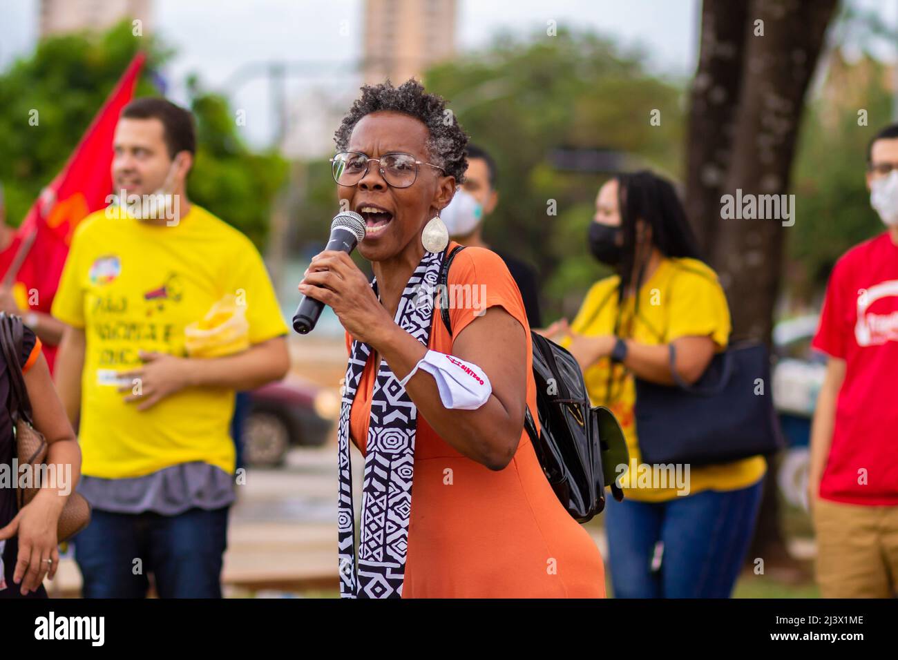 Goiânia, Goias, Brazil – April 09, 2022: A woman speaking into the  microphone. Photo taken during a protest, in the city of Goiânia, against  President Stock Photo - Alamy