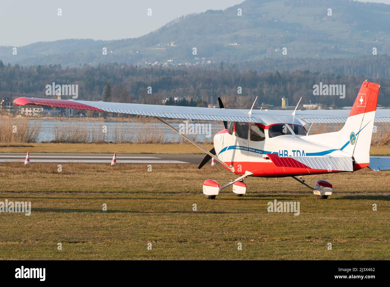 Wangen-Lachen, Switzerland, March 27, 2022 Cessna 172 propeller plane on the parking area on a small airfield Stock Photo