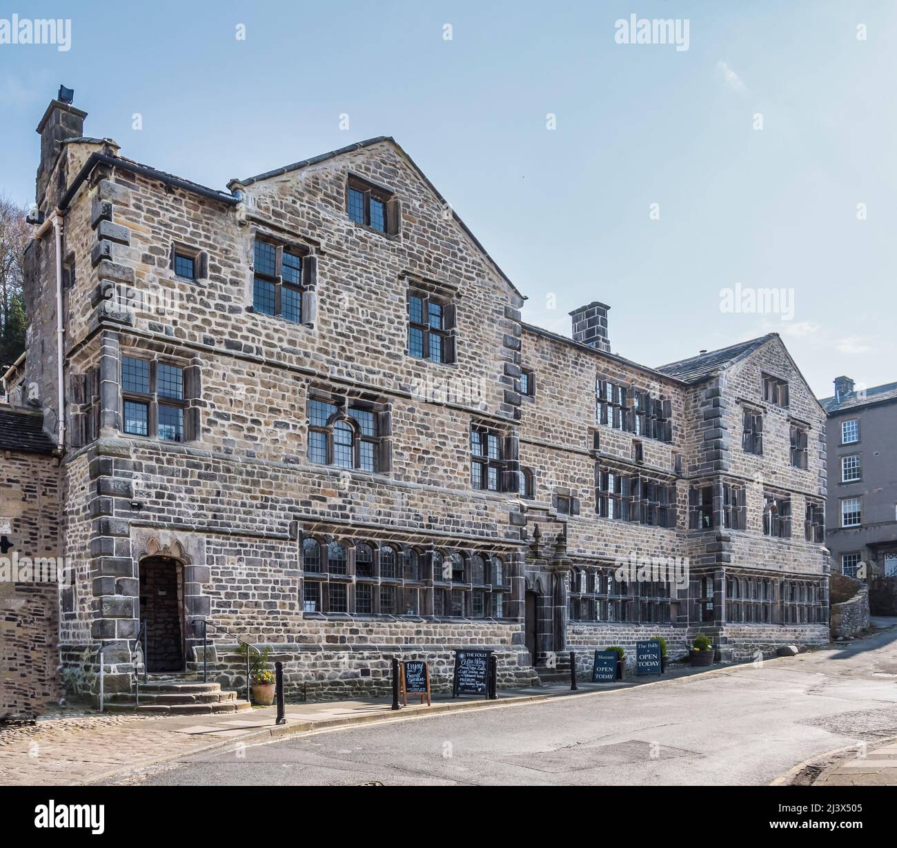 The image is of the 16th century building known as the Folly, now the Museum of North Craven in the Yorkshire Dales Market town of Settle Stock Photo
