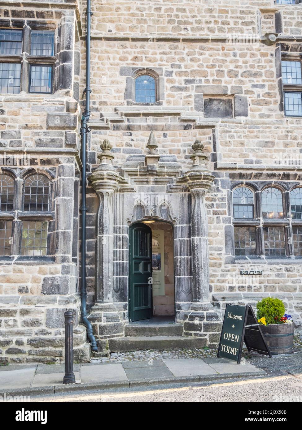 The image is of the 16th century building known as the Folly, now the Museum of North Craven in the Yorkshire Dales Market town of Settle Stock Photo