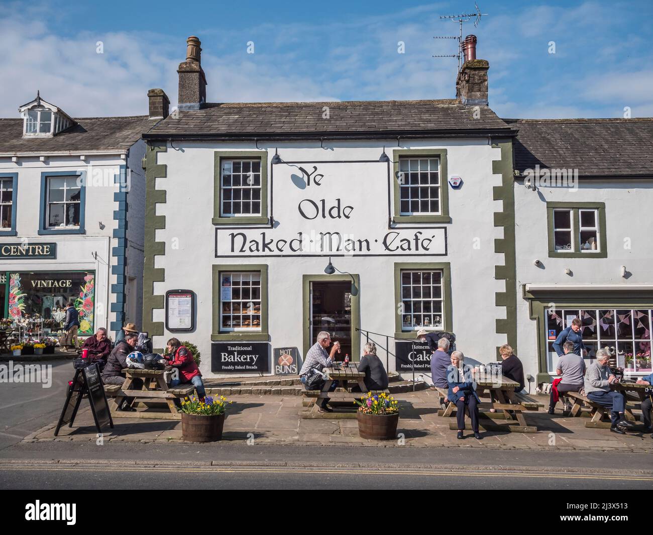 The image is of the market square in the Yorkshire Market town of Settle famed as the starting point on the Settle-Carlisle scenic railway Stock Photo