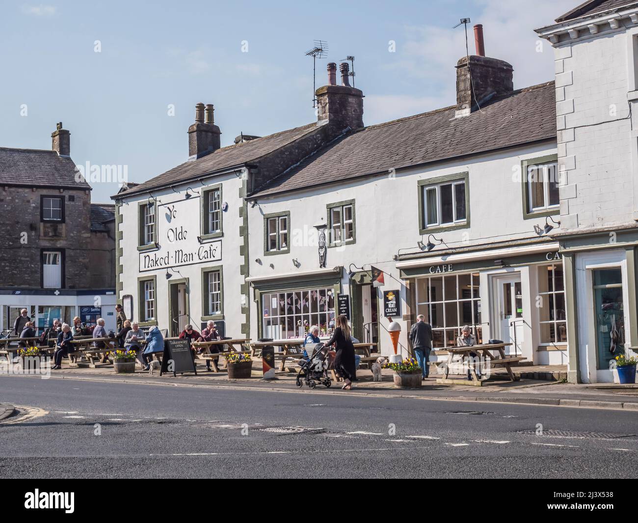 The image is of the market square in the Yorkshire Market town of Settle famed as the starting point on the Settle-Carlisle scenic railway Stock Photo