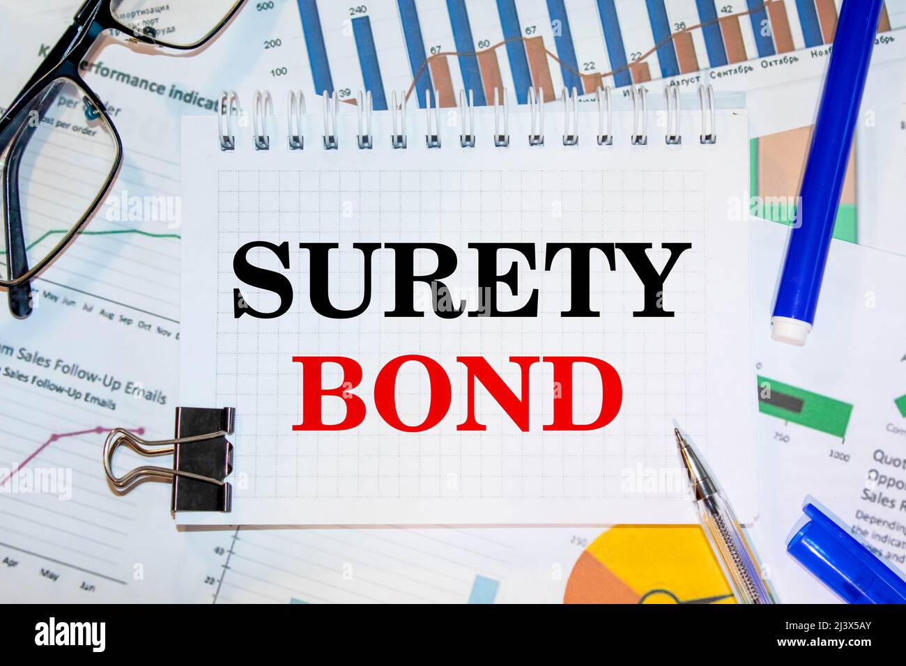 Paper with Surety Bond on a table Stock Photo Alamy