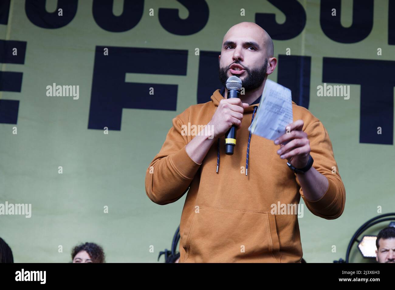 Paris, France. 9th Apr, 2022. Gabriel Mazzolini of Amis de la Terre, speaks at the arrival of the March for the Future in Paris, France. Stock Photo