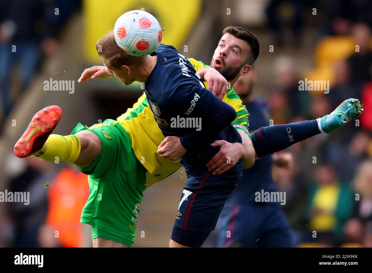 Carrow Road, Norwich, Norfolk, UK. 10th Apr, 2022. Premier League football, Norwich versus Burnley; Grant Hanley of Norwich City competes for the ball with Mat&#x11b;j Vydra of Burnley Credit: Action Plus Sports/Alamy Live News Stock Photo