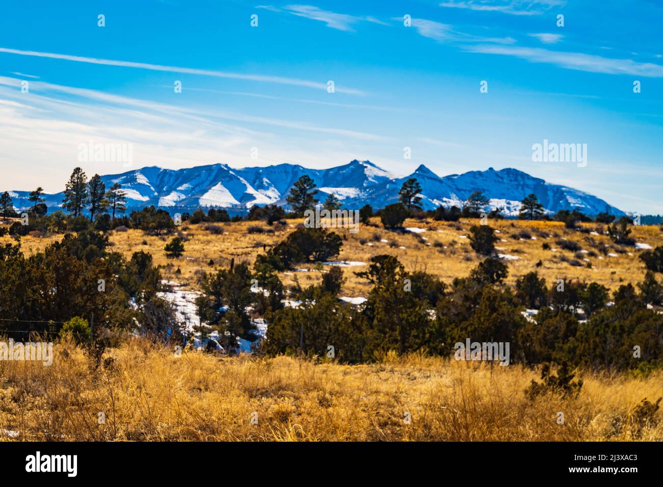snow covered Ortiz Mountain Range in northern New Mexico Stock Photo