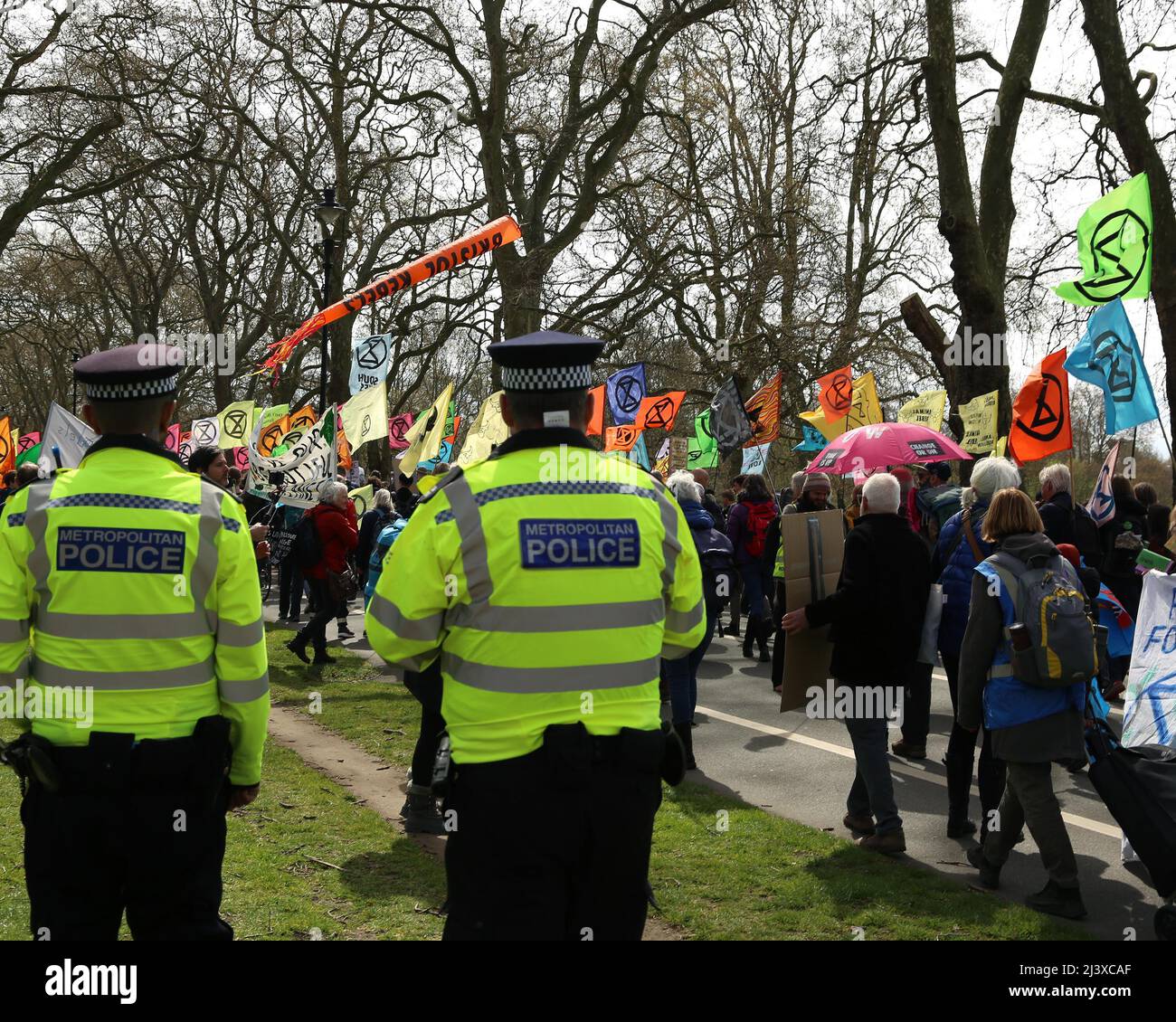 London, UK. 09th Apr, 2022. Police monitor the Extinction Rebellion march through London on the second day of climate activism. 10th April 2022. Anna Hatfield/ Pathos Credit: Pathos Images/Alamy Live News Stock Photo