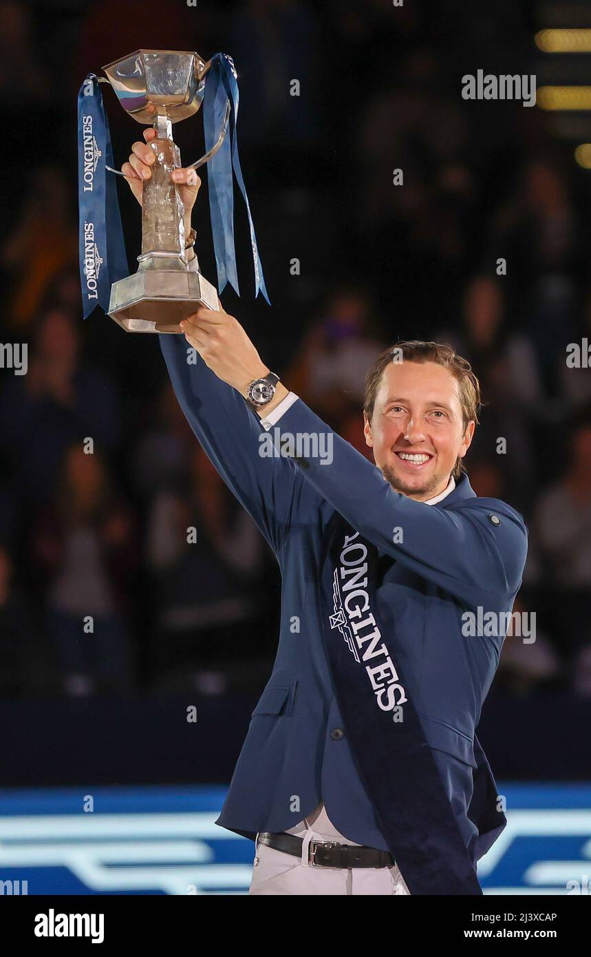 Leipzig, Germany. 10th Apr, 2022. Martin Fuchs from Switzerland cheers after his victory in the final of the Longines Fei Jumping World Cup at the Leipzig Fair. Credit: Jan Woitas/dpa/Alamy Live News Stock Photo