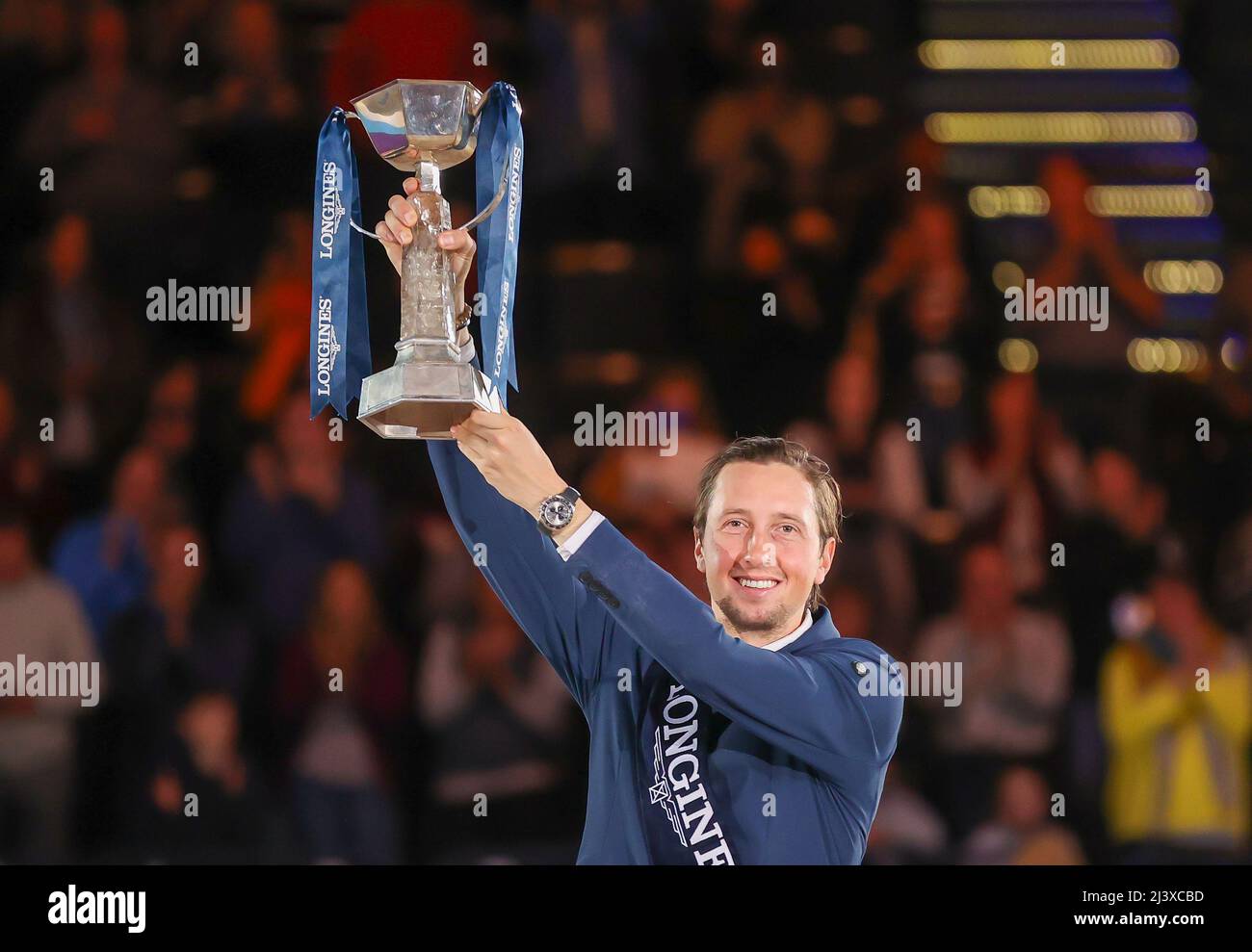 Leipzig, Germany. 10th Apr, 2022. Martin Fuchs from Switzerland cheers after his victory in the final of the Longines Fei Jumping World Cup at the Leipzig Fair. Credit: Jan Woitas/dpa/Alamy Live News Stock Photo