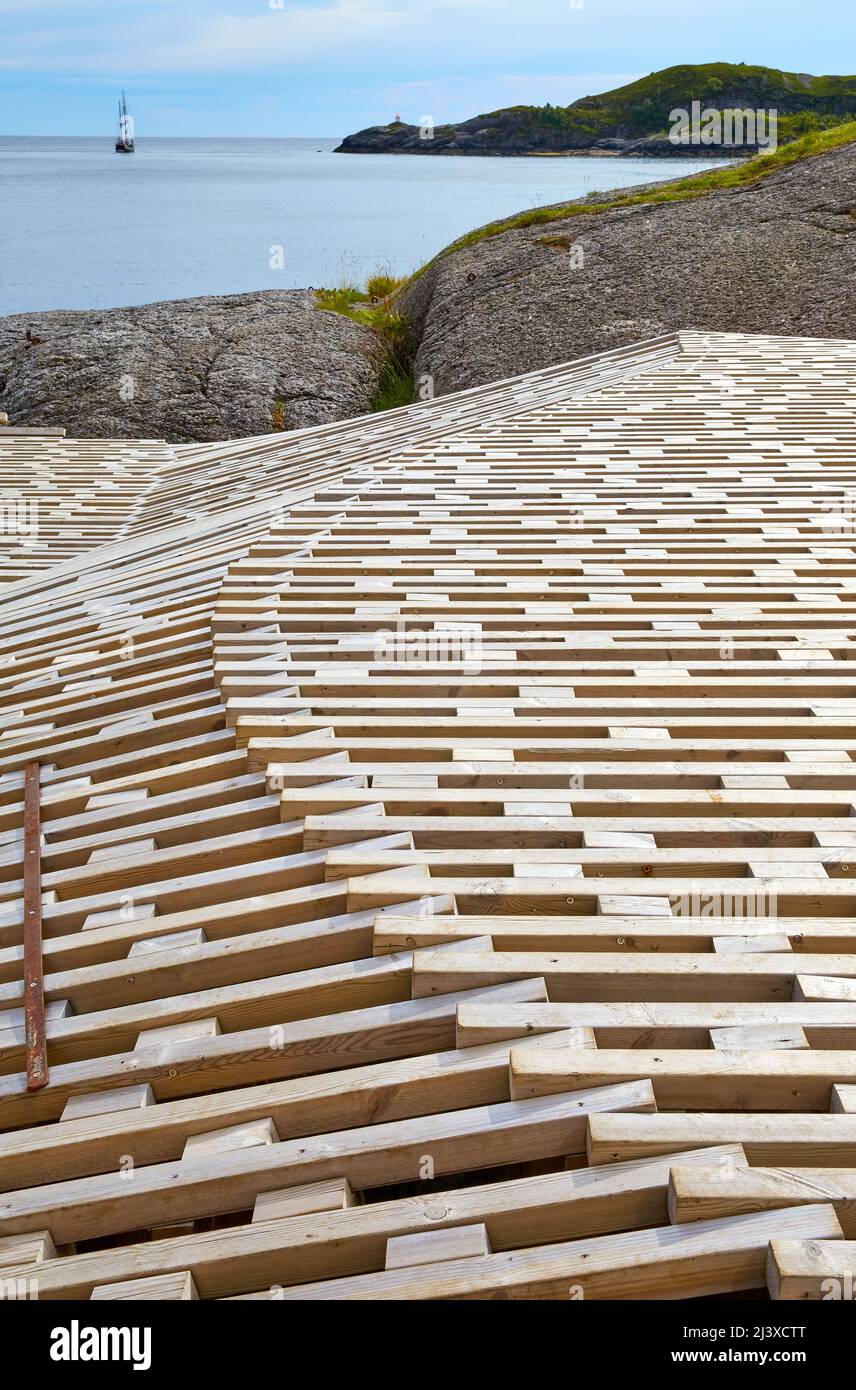 Wooden sunning terrace outside a health spa in the heritage fishing village of Nusfjord in the Lofoten Islands Norway Stock Photo