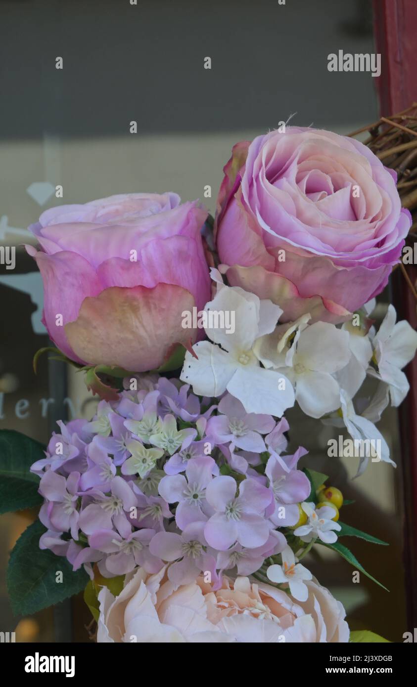 flower garland outside shop, england Stock Photo Alamy