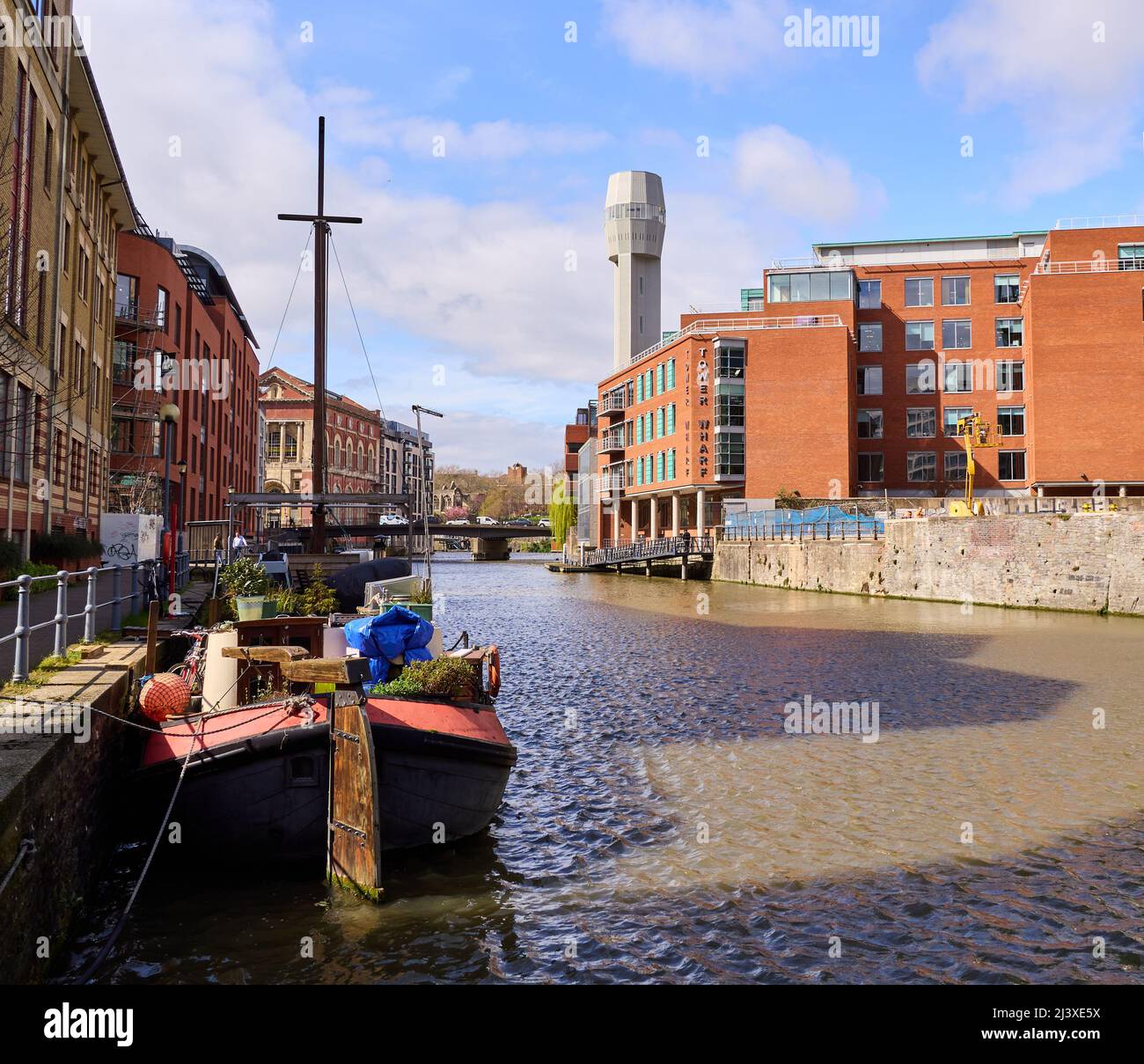 Tower Wharf buildings and Cheese Lane shot tower by the Floating Harbour in Bristol UK Stock Photo