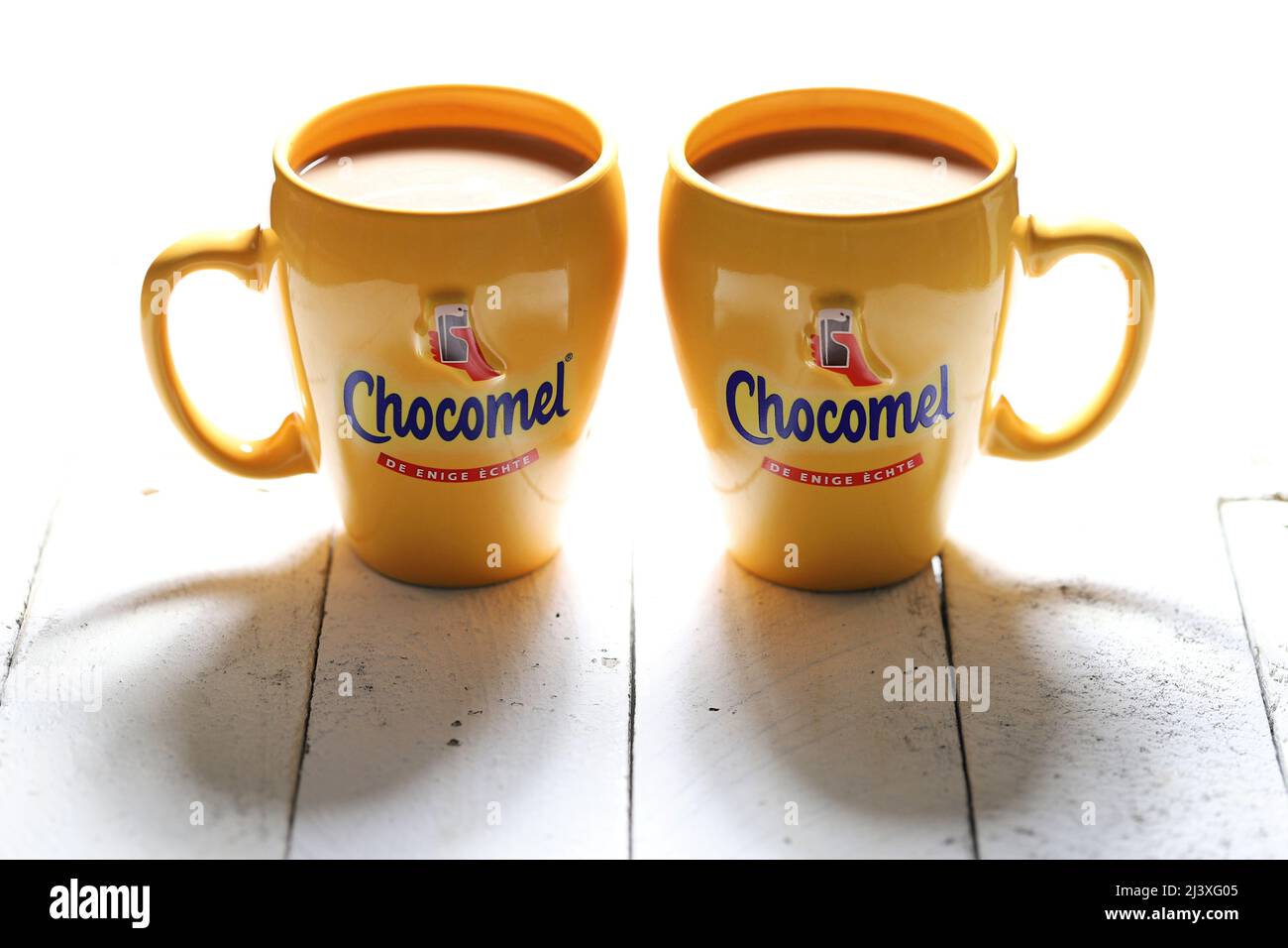 pair of Chocomel mugs chocolate-flavoured milk on wooden background Stock Photo Alamy