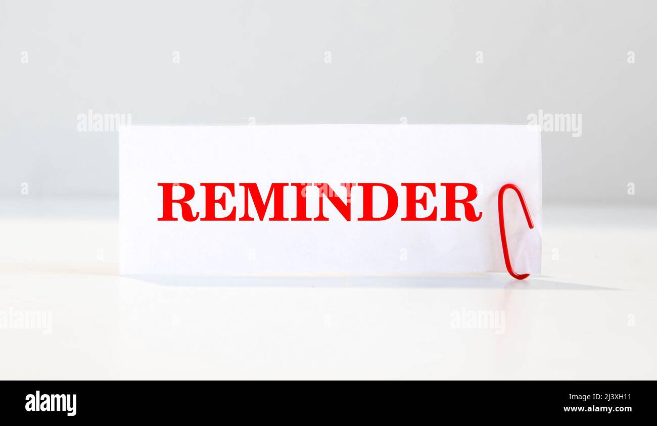 word REMINDER on white paper Stock Photo - Alamy