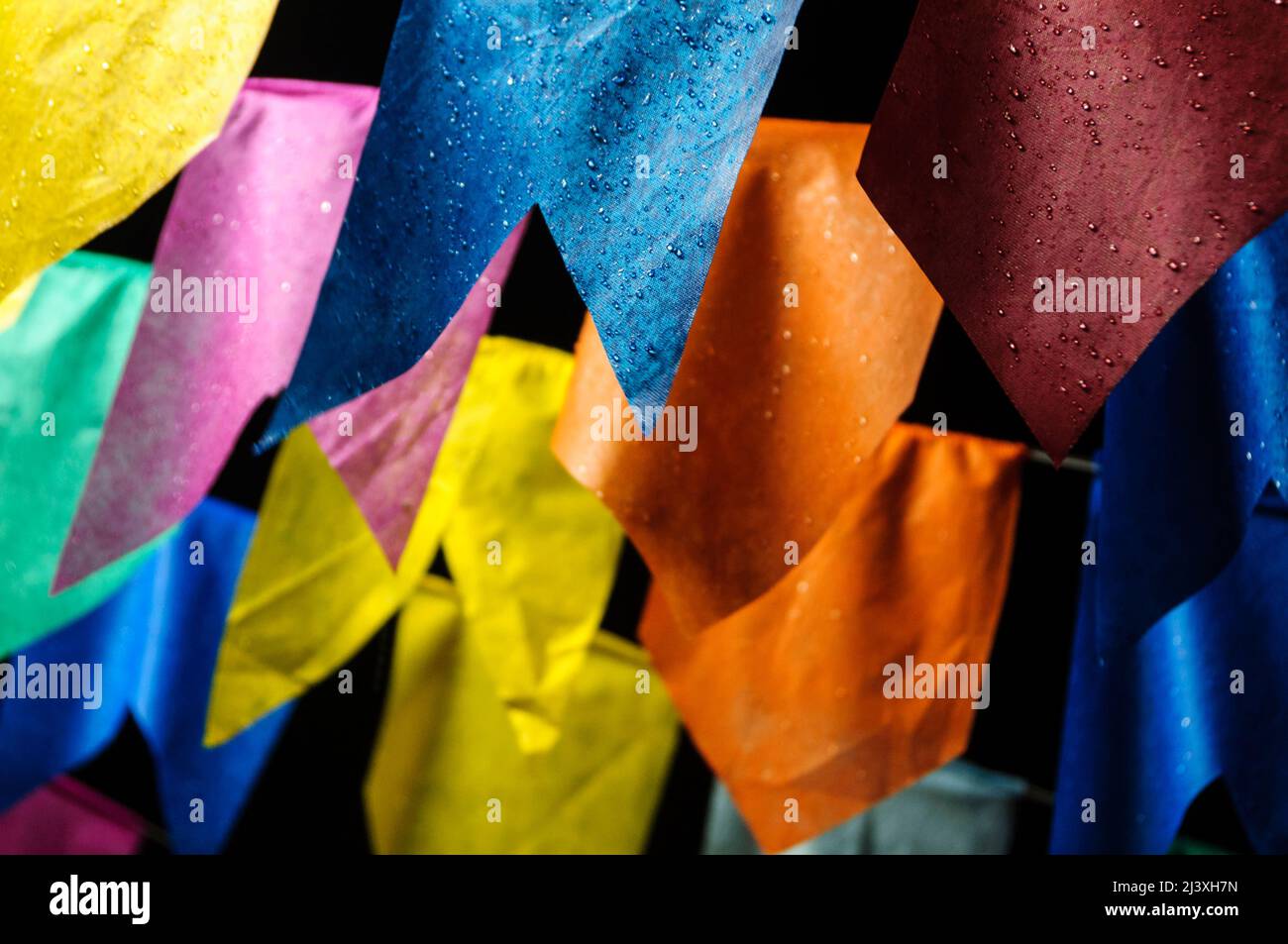 wet colored flags in June decoration Stock Photo