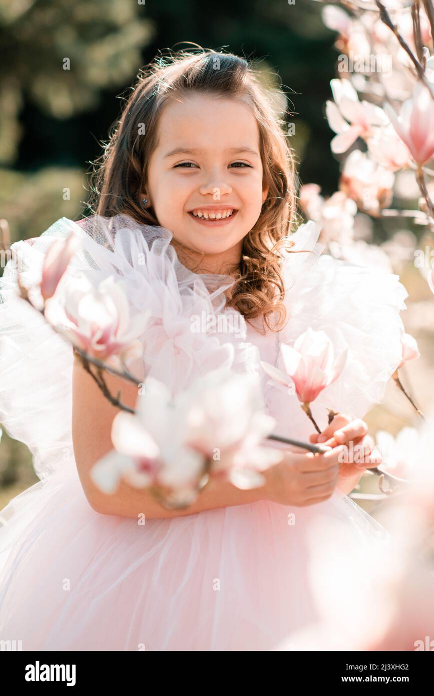 Beautiful smiling kid girl 45 year old wear stylish princess dress