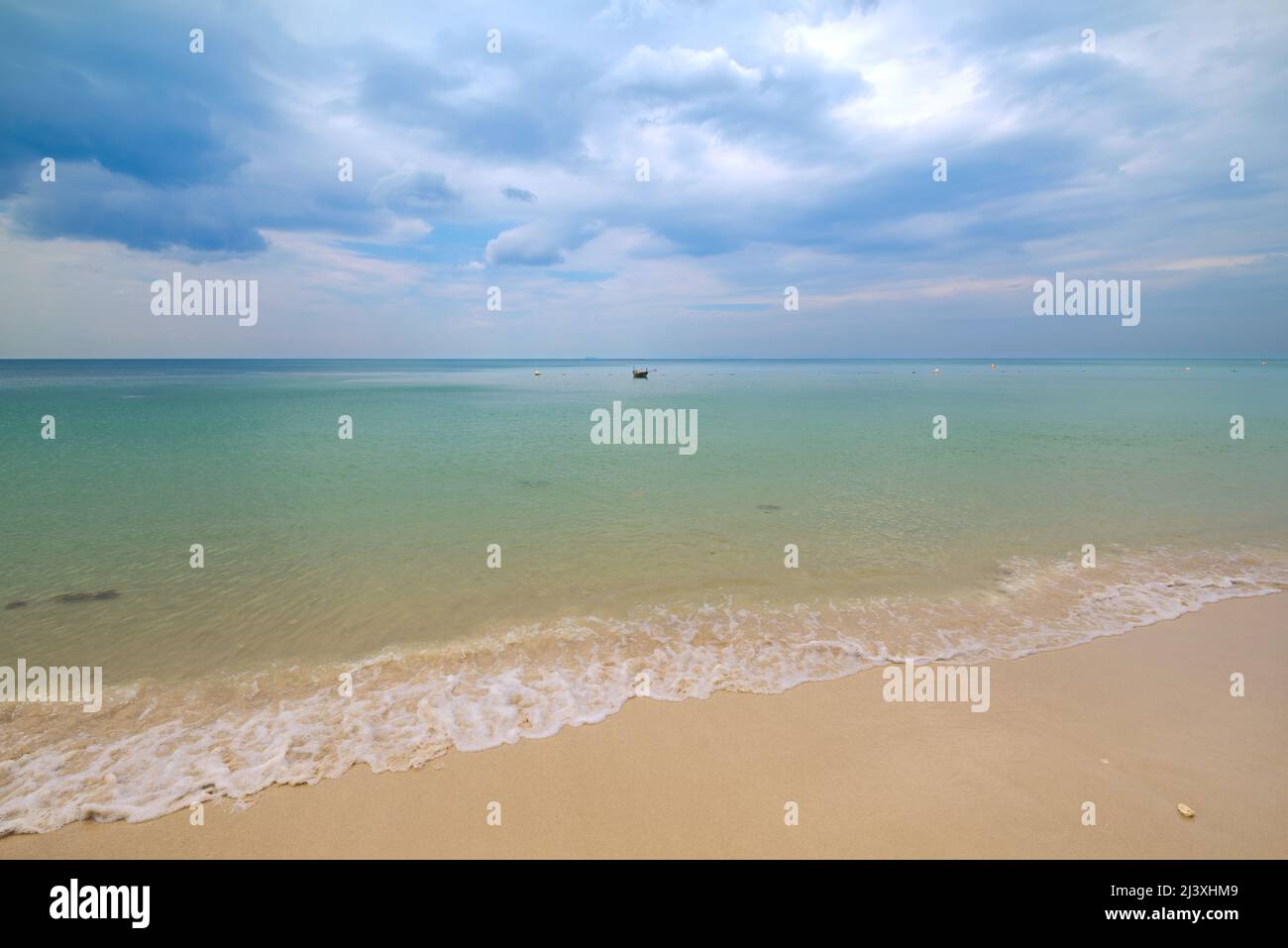 Empty exotic tropical beach with beautiful clouds. Relaxing sea view Stock Photo