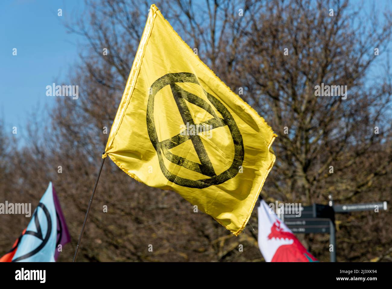 Extinction Rebellion protesters launching a period of civil disruption in London from the 9 April 2022. XR logo flag in Hyde Park Stock Photo