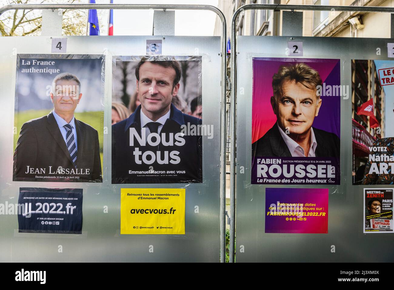 A polling station in the Brussels french embassy for the french election attract french people living in Saint-Josse to vote. Campaign posters | Des b Stock Photo