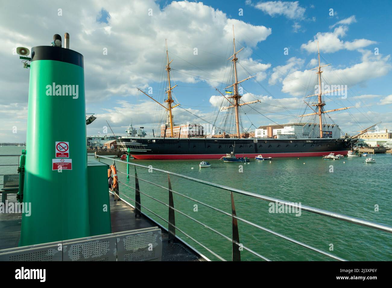 HMS Warrior historic Royal Navy warship seen from Gosport Ferry at Portsmouth Harbour, Hampshire, England. Stock Photo