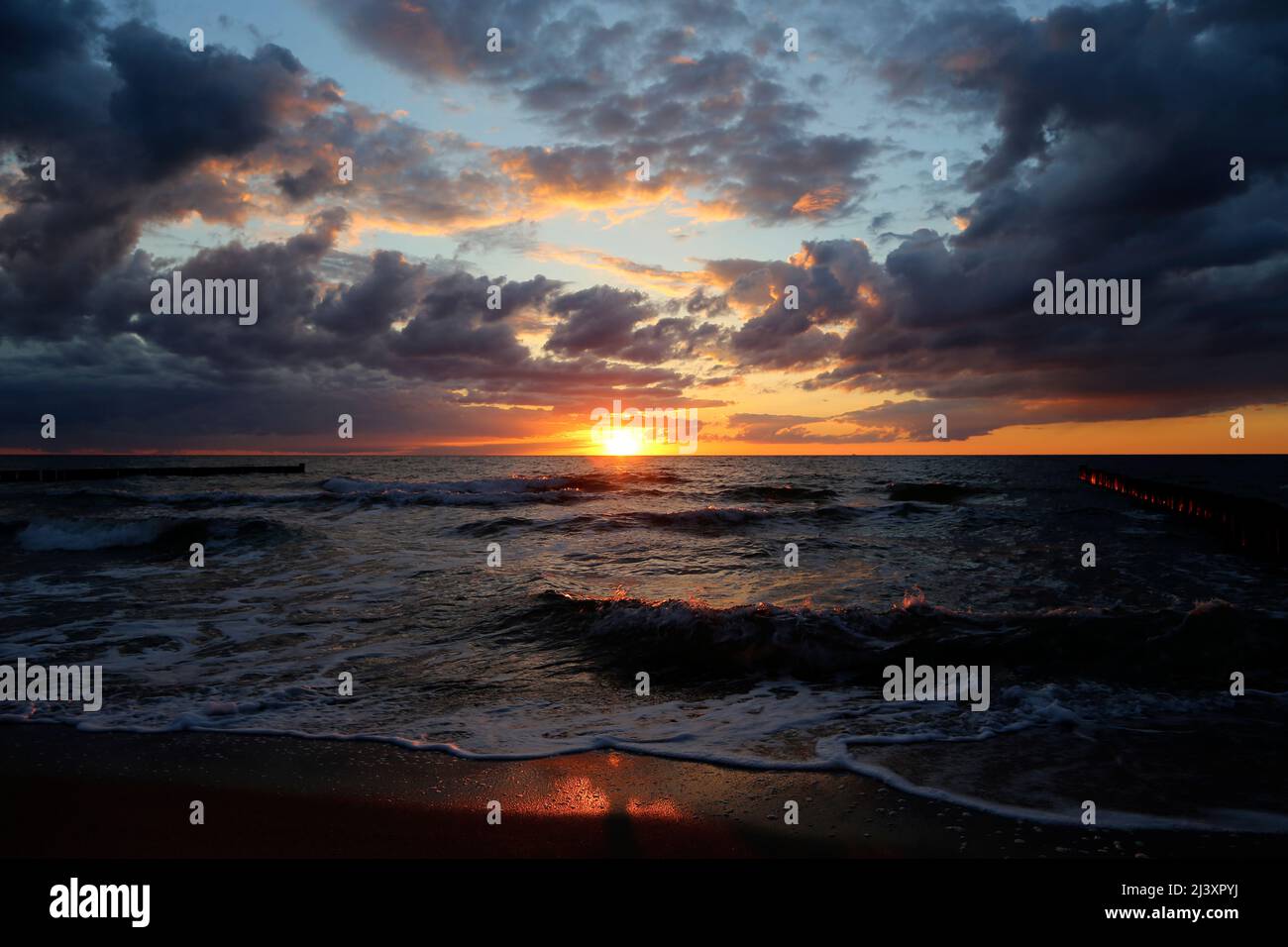 beautiful dramatic sunset at the baltic sea Stock Photo - Alamy