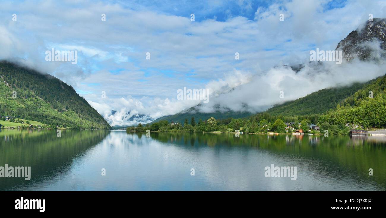 Lake Grundlsee, view of the surrounding mountains and nature with clouds, Eastern Alps, Liezen district in Styria, Austria, Europe. Stock Photo