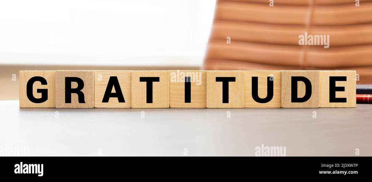 gratitude word written on wood block. gratitude text on wooden table for your desing, concept Stock Photo