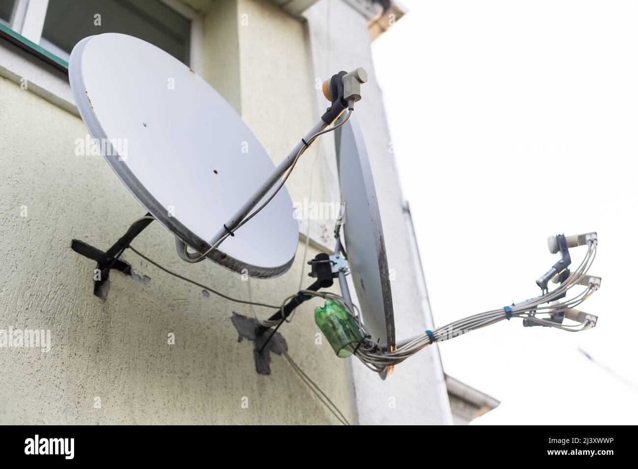 satellite dish and television antenna on roof top Stock Photo Alamy
