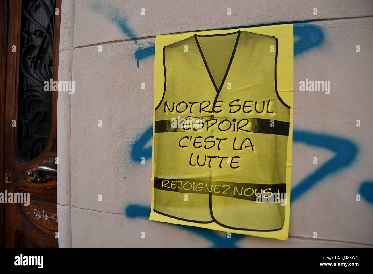 Marseille, France. 09th Apr, 2022. A poster of the Yellow Vests (“Gilets  Jaunes” in french) is placed on a wall during the demonstration. Activists  from the Yellow Vests (“Gilets Jaunes” in french)