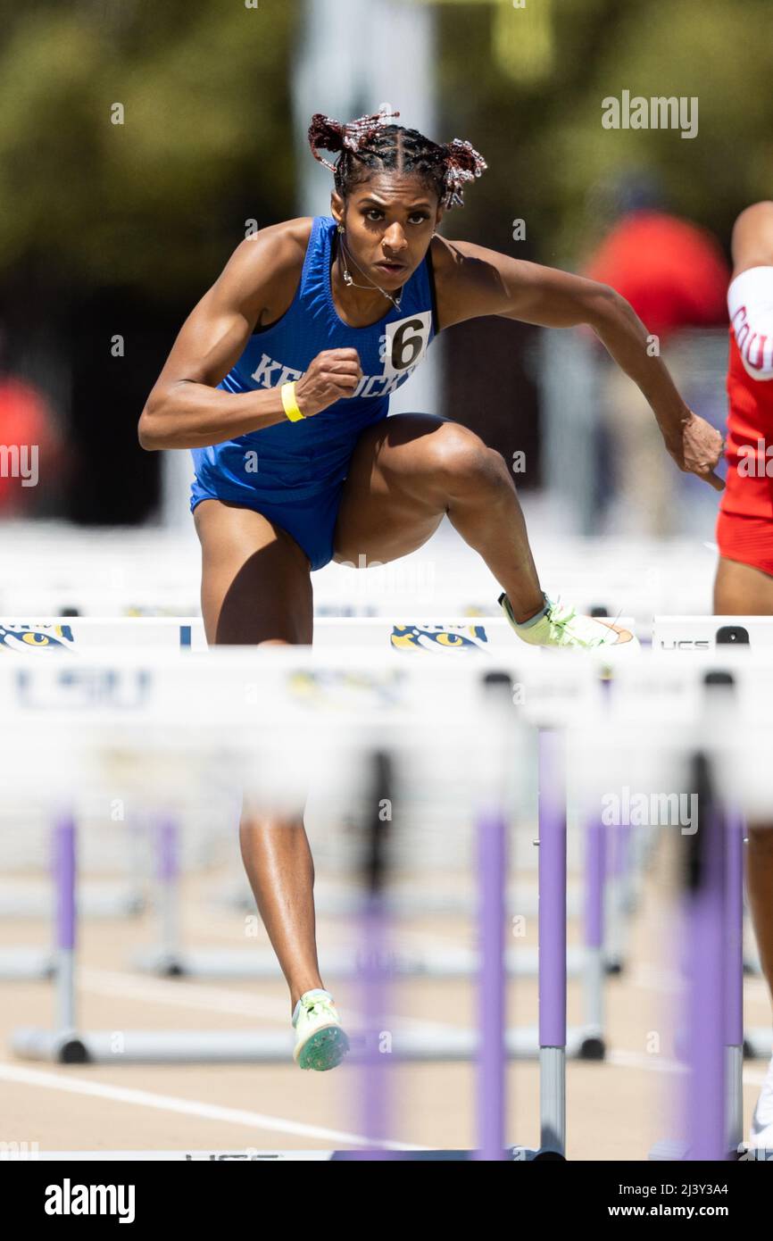 Masai Russell of Kentucky runs the 100 hurldes in a time of 12.75