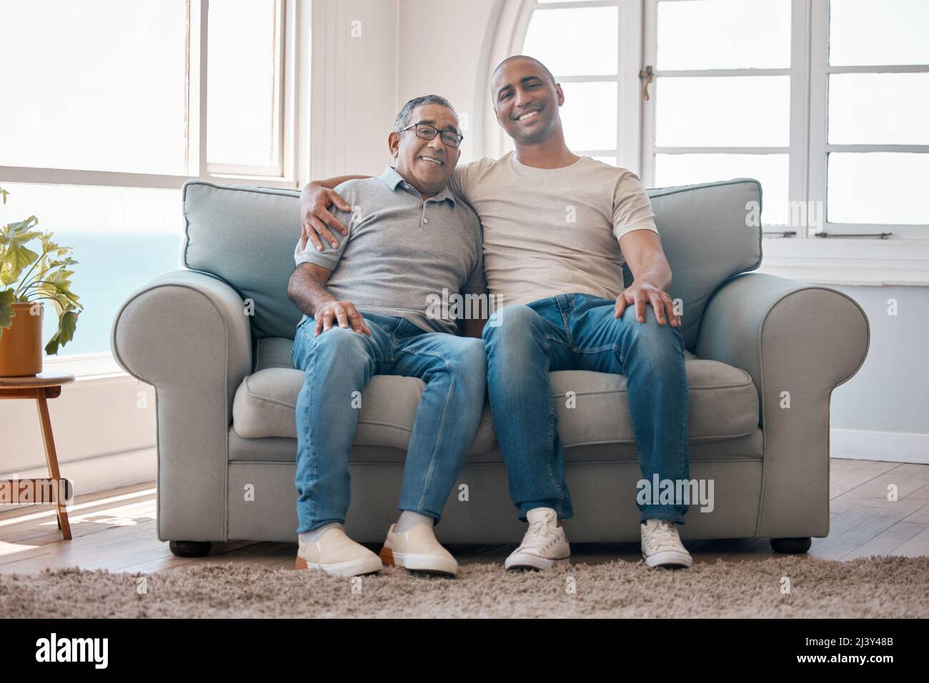Seeing my son grow into a man. Shot of a young man spending time with his father. Stock Photo