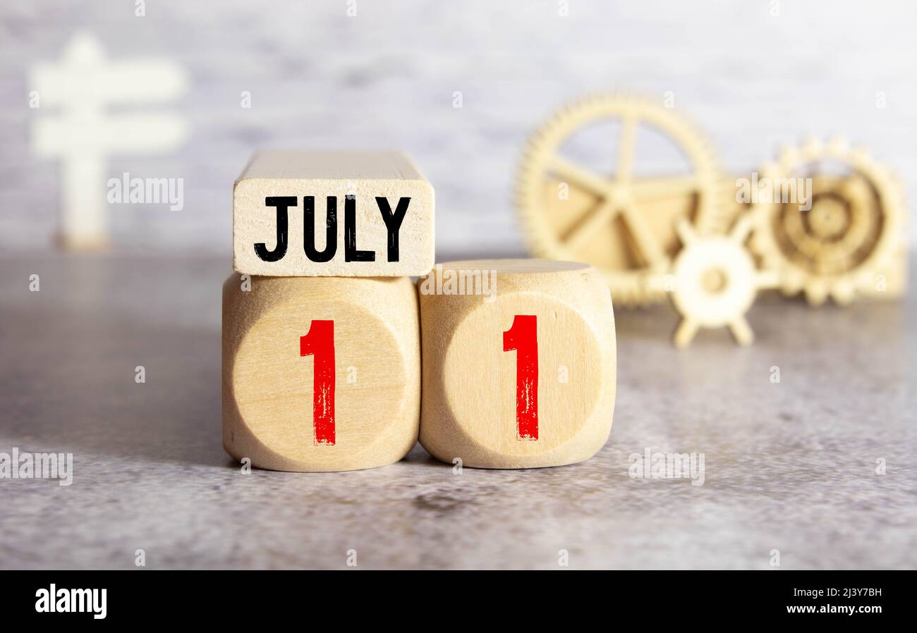 JULY 11 Wooden calendar. World Population Day. White background with space for your text. Stock Photo