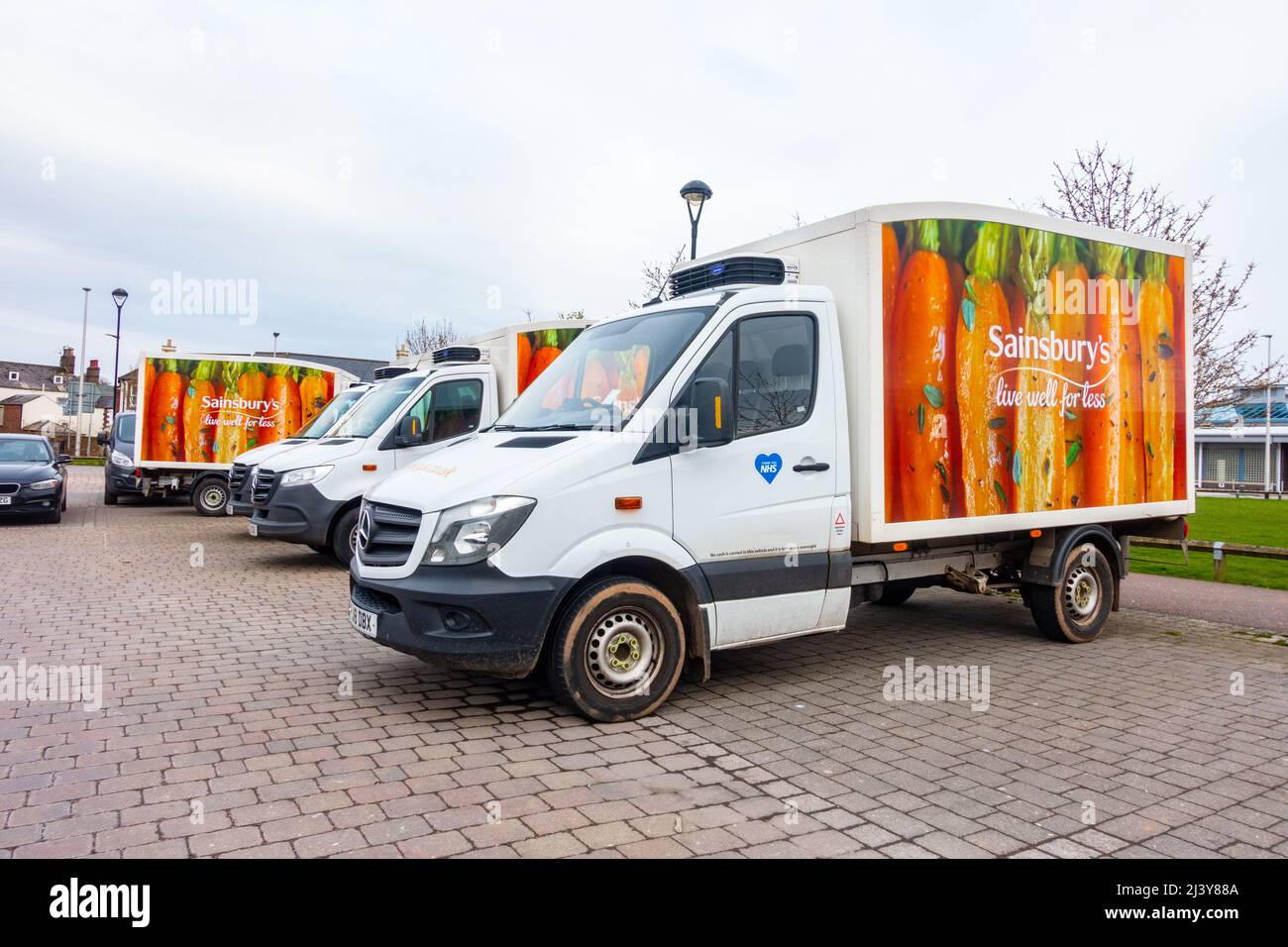 Sainsbury's supermarket delivery vans used for home delivery of groceries ordered online Stock