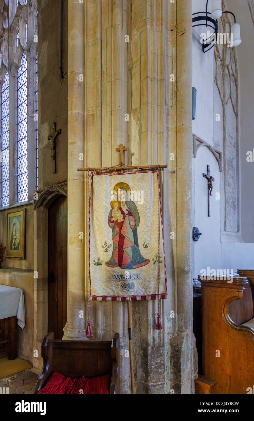 Typical Mothers' Union pole-mounted tapestry banner in St Mary the Virgin Church, Wiveton, a small village in north Norfolk, East Anglia, England Stock Photo